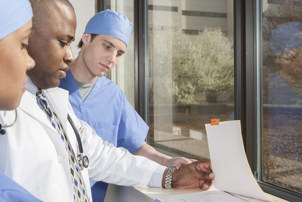 hospital staff reading test results